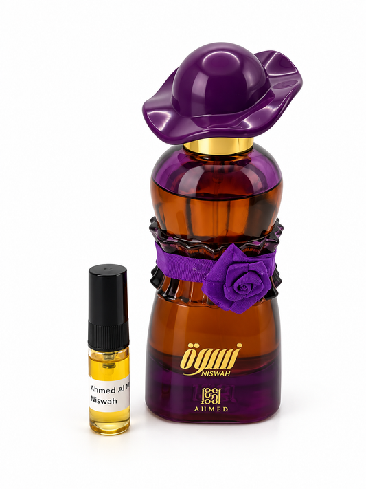 Ahmed Al Maghribi Niswah fragrance bottle and black-capped sample vial on white