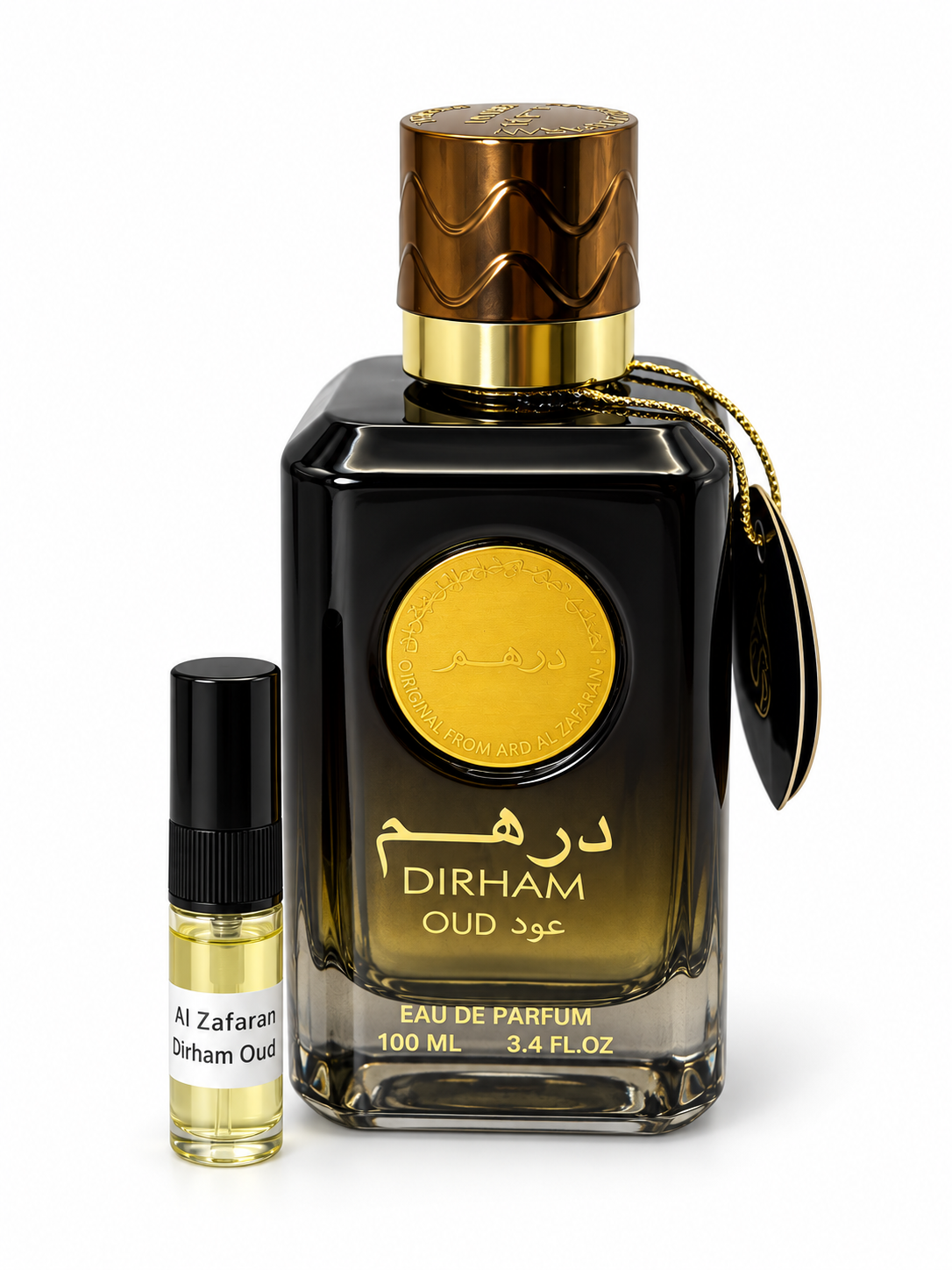 Dirham Oud Ard Al Zafaran fragrance bottle and black-capped sample vial on white