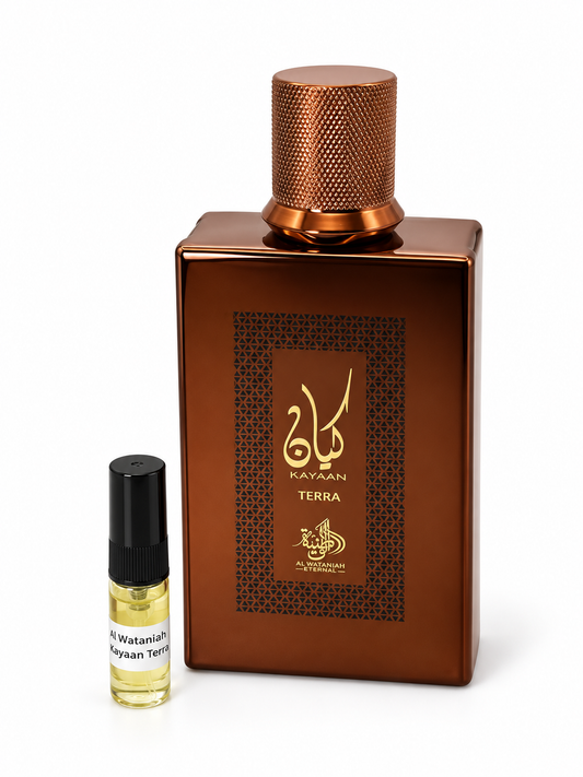 Al Wataniah Kayaan Terra fragrance bottle and black-capped sample vial on white