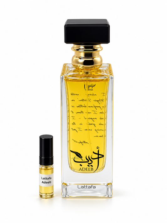Lattafa Adeeb fragrance bottle and black-capped sample vial on white