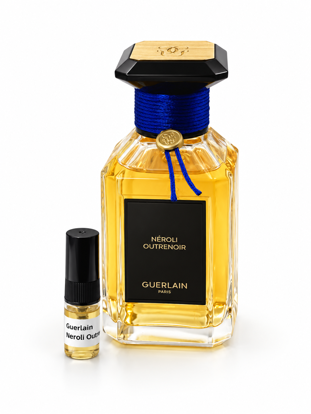 Guerlain Neroli Outrenoir fragrance bottle and black-capped sample vial on white