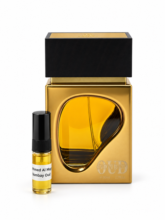 Ahmed Al Maghribi Bombay Oud fragrance bottle and black-capped sample vial on white