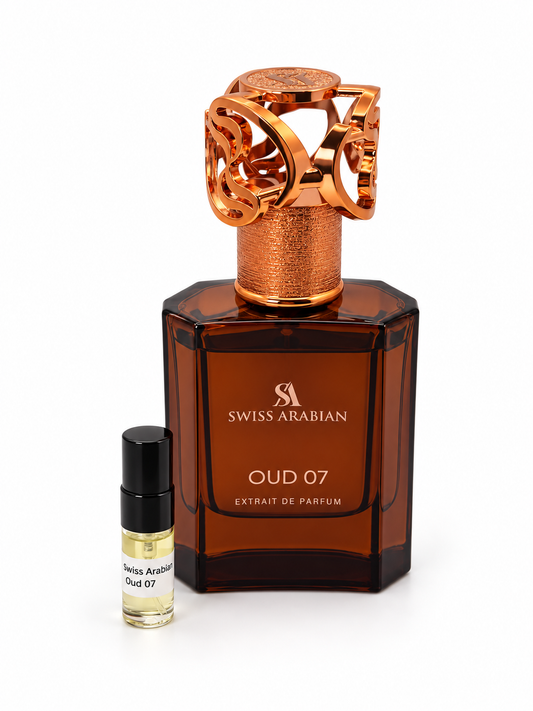 Swiss Arabian Oud 07 fragrance bottle and black-capped sample vial on white