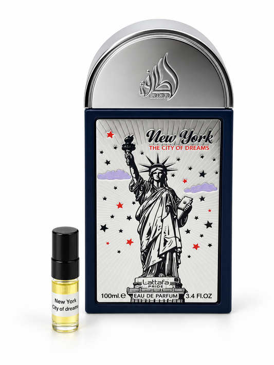 Lattafa Pride New York The City Of Dreams fragrance bottle and black-capped sample vial on white