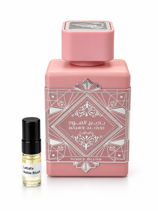 Lattafa Bade'e Al Oud Noble Blush fragrance bottle and black-capped sample vial on white