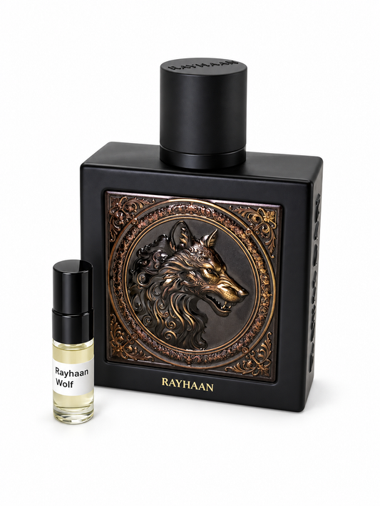 Rayhaan Wolf fragrance bottle and black-capped sample vial on white