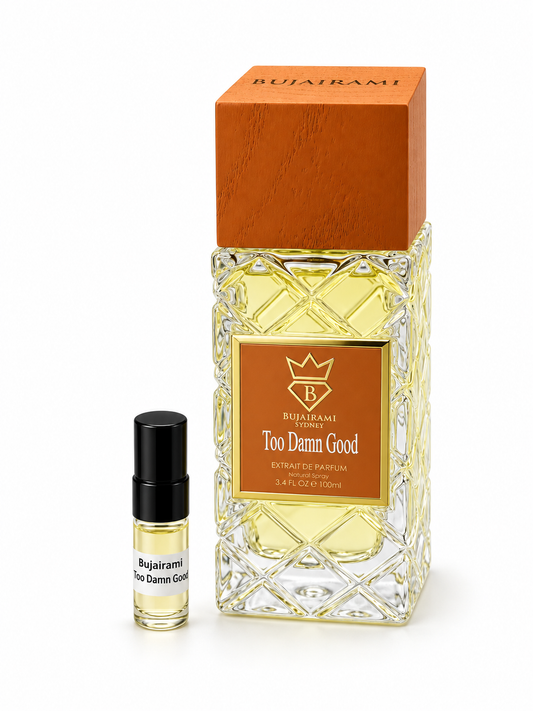 Bujairami Too Damn Good fragrance bottle and black-capped sample vial on white