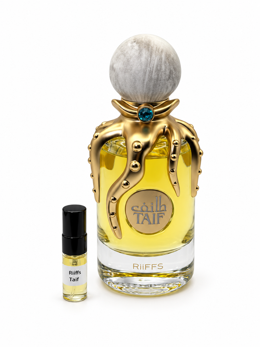 Riiffs Taif fragrance bottle and black-capped sample vial on white