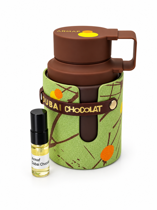 Armaf Odyssey Dubai Chocolat fragrance bottle and black-capped sample vial on white
