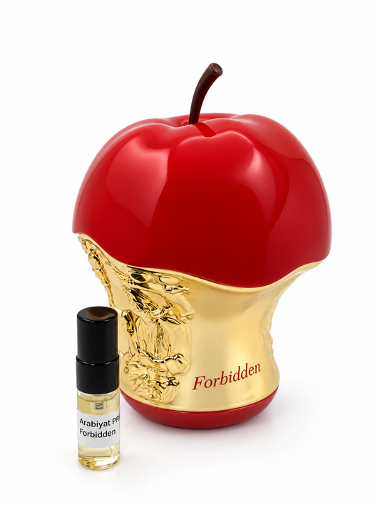 Arabiyat Prestige Forbidden fragrance bottle and black-capped sample vial on white