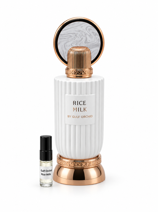 Gulf Orchid Rice Milk fragrance bottle and black-capped sample vial on white