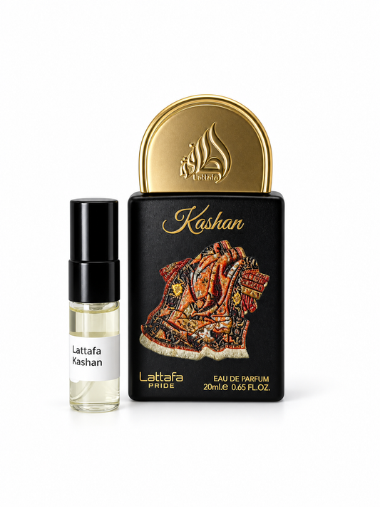 Lattafa Pride Kashan fragrance bottle and black-capped sample vial on white