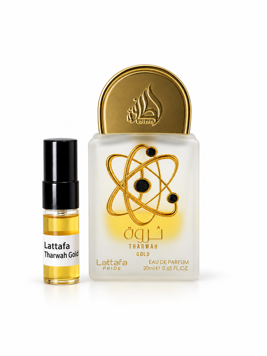 Lattafa Pride Tharwah Gold fragrance bottle and black-capped sample vial on white