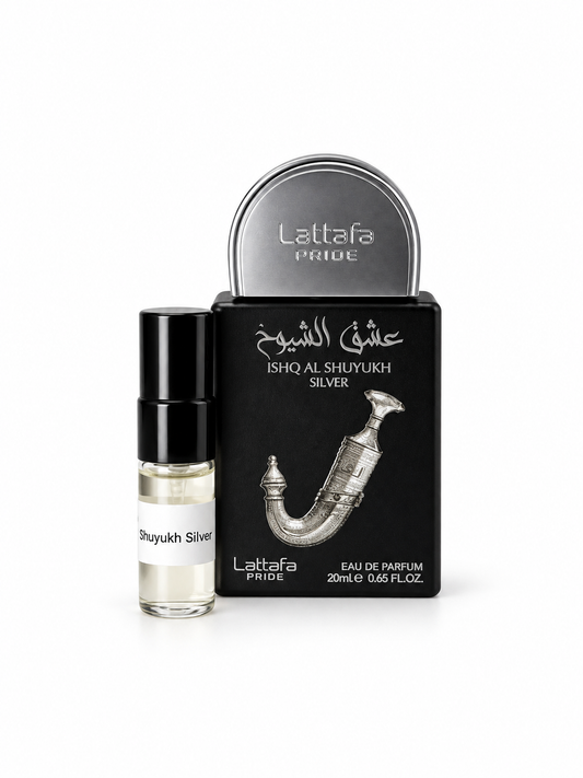 Lattafa Pride Ishq Al Shuyukh Silver fragrance bottle and black-capped sample vial on white