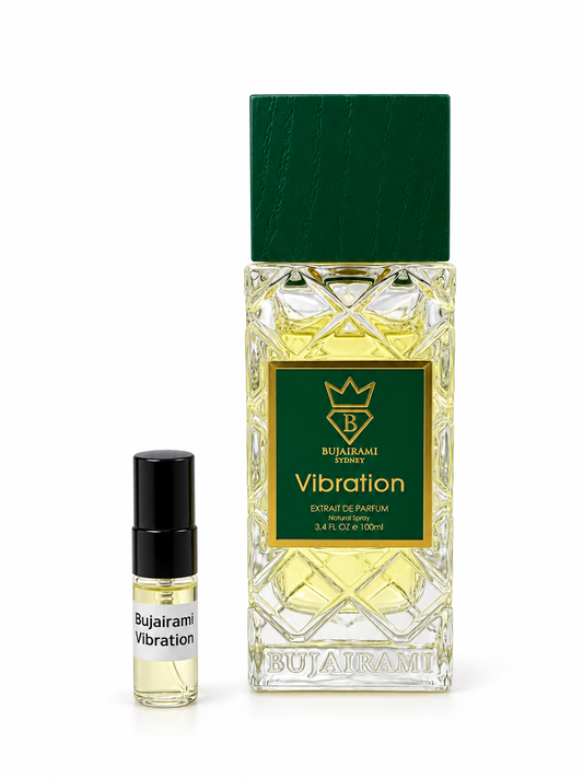 Bujairami Vibration fragrance bottle and black-capped sample vial on white