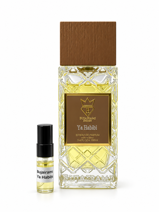 Bujairami Ya Habibi fragrance bottle and black-capped sample vial on white