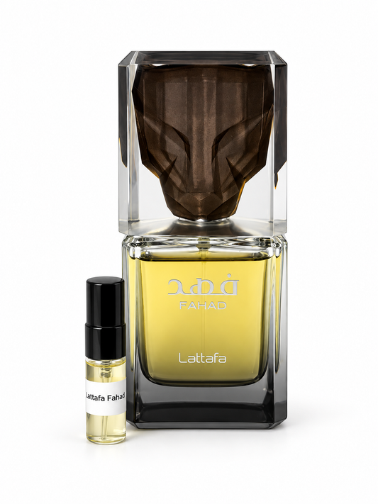 Lattafa Fahad fragrance bottle and black-capped sample vial on white