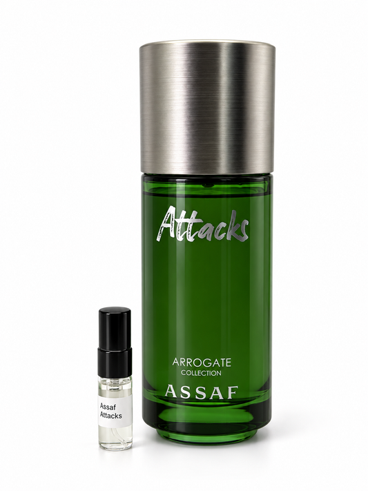 Assaf Attacks fragrance bottle and black-capped sample vial on white