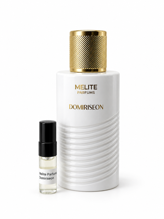 Melite Parfums Domiriseon fragrance bottle and black-capped sample vial on white
