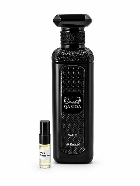 Faan Qasida Sahm fragrance bottle and black-capped sample vial on white
