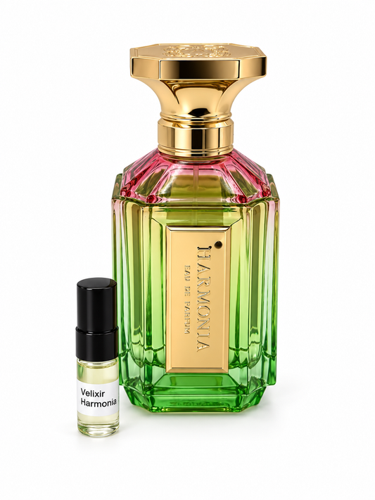Velixir Harmonia fragrance bottle and black-capped sample vial on white