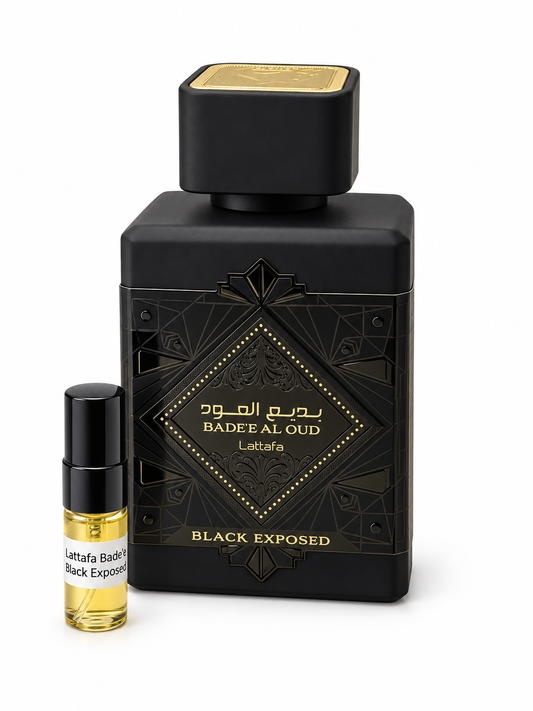 Lattafa Badee Al Oud Black Exposed fragrance bottle and black-capped sample vial on white