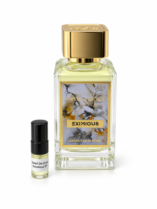 Soleil De Grace Eximious fragrance bottle and black-capped sample vial on white