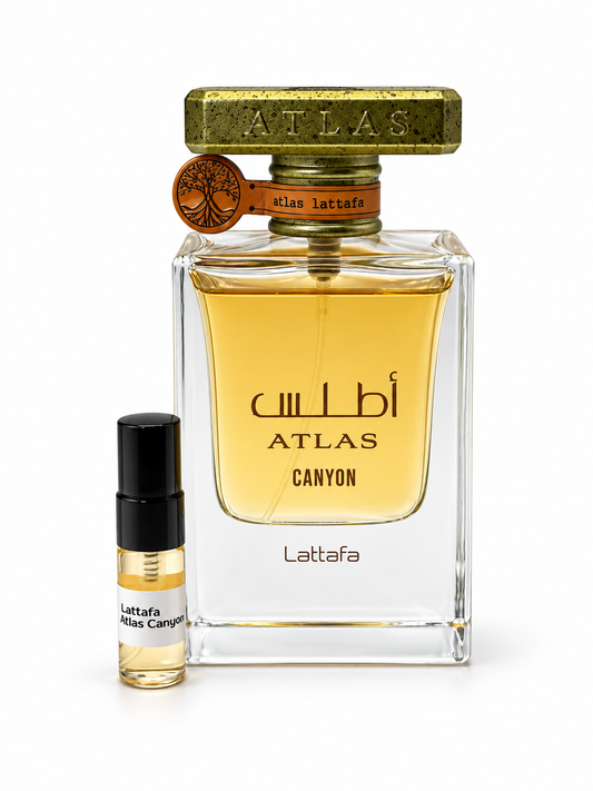 Lattafa Atlas Canyon fragrance bottle and black-capped sample vial on white