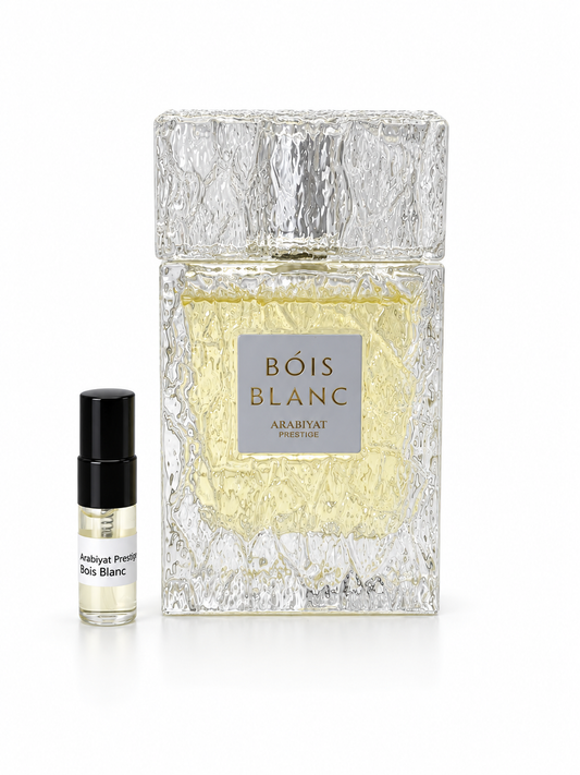 Arabiyat Prestige Bois Blanc fragrance bottle and black-capped sample vial on white