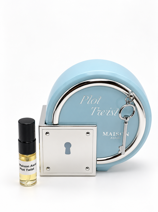 Maison Asrar Plot Twist with black-capped sample vial — studio photograph