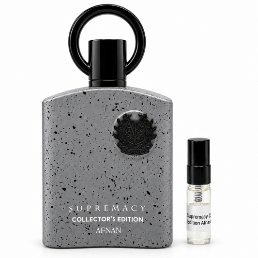 Afnan Supremacy Collectors Edition bottle with a black-capped sample vial on a white background